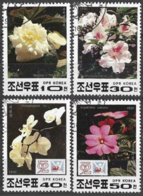 Corea del Norte #3038 y #3040 - 3042 1991 "Flores - Exhibición juvenil de filatelia Canada 92"